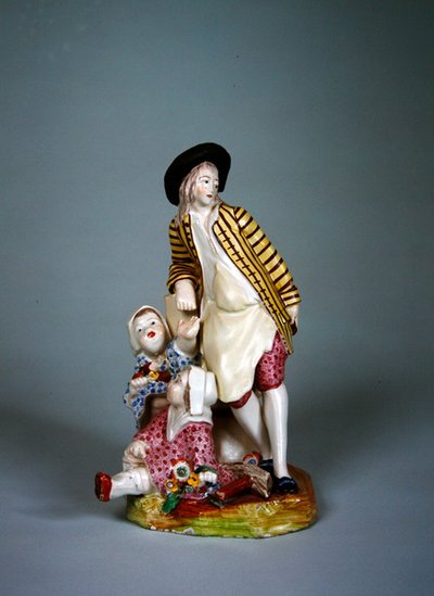 Sceaux manufacture statuette of a young cooper or blacksmith with his two daughters by French School